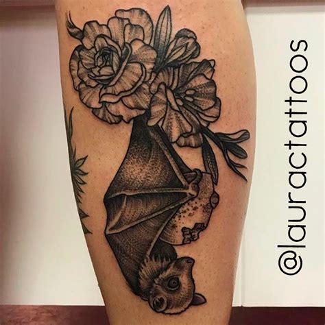 bat and flowers tattoo